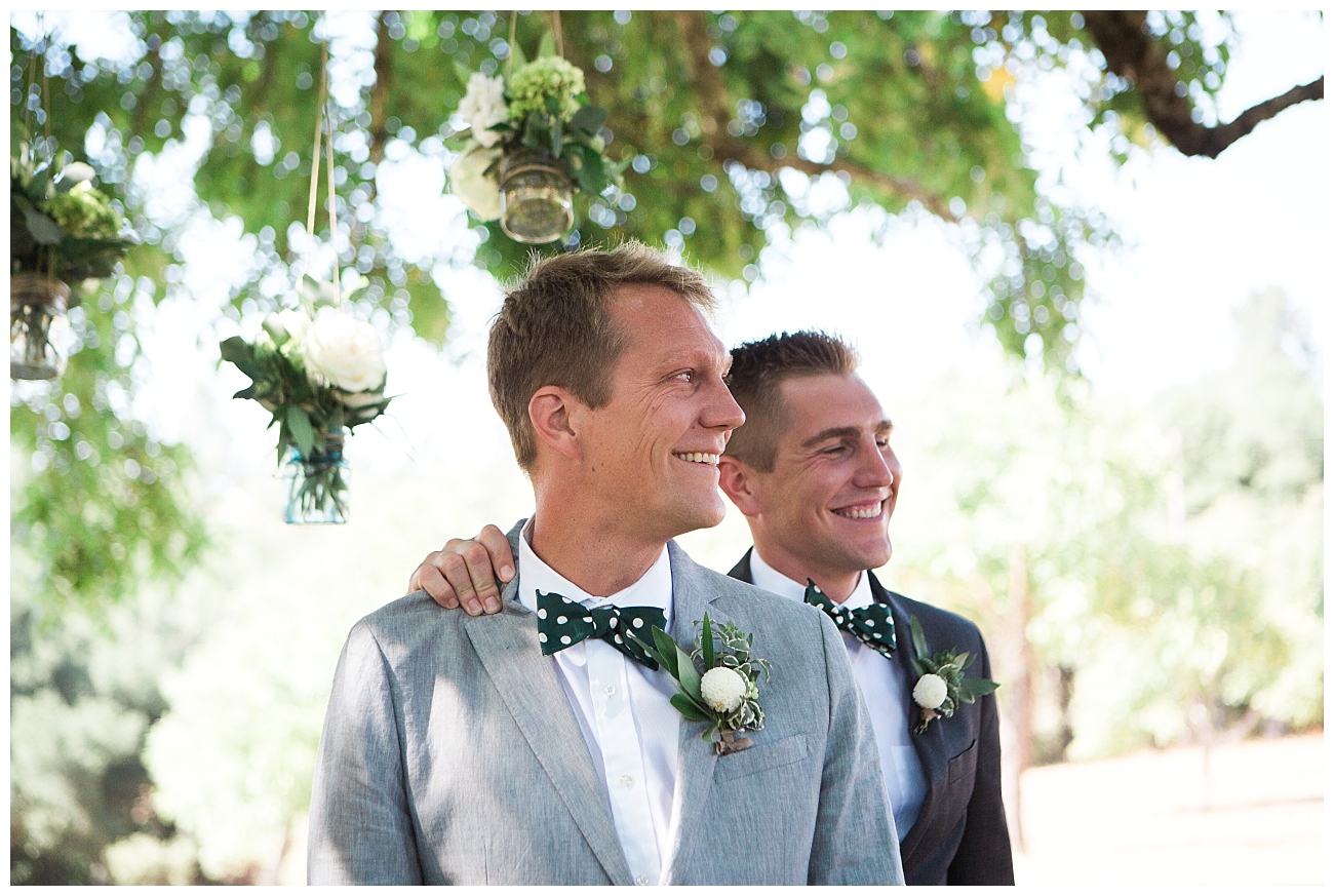 grooms face while bride walking down aisle triple s ranch napa wedding